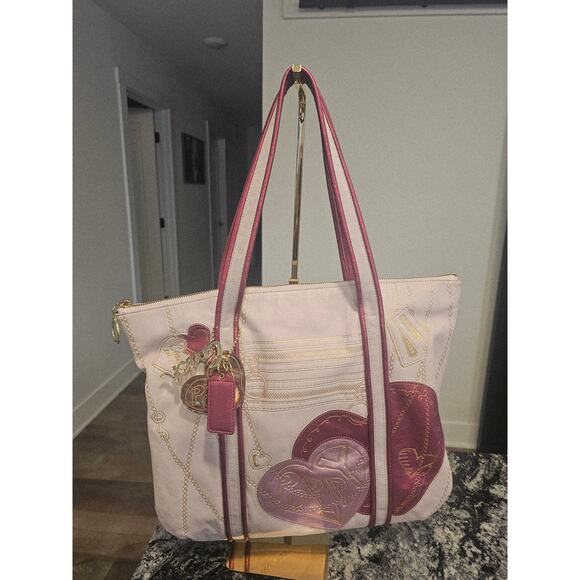 Coach Poppy Hearts Glam Tote in Excellent used condition